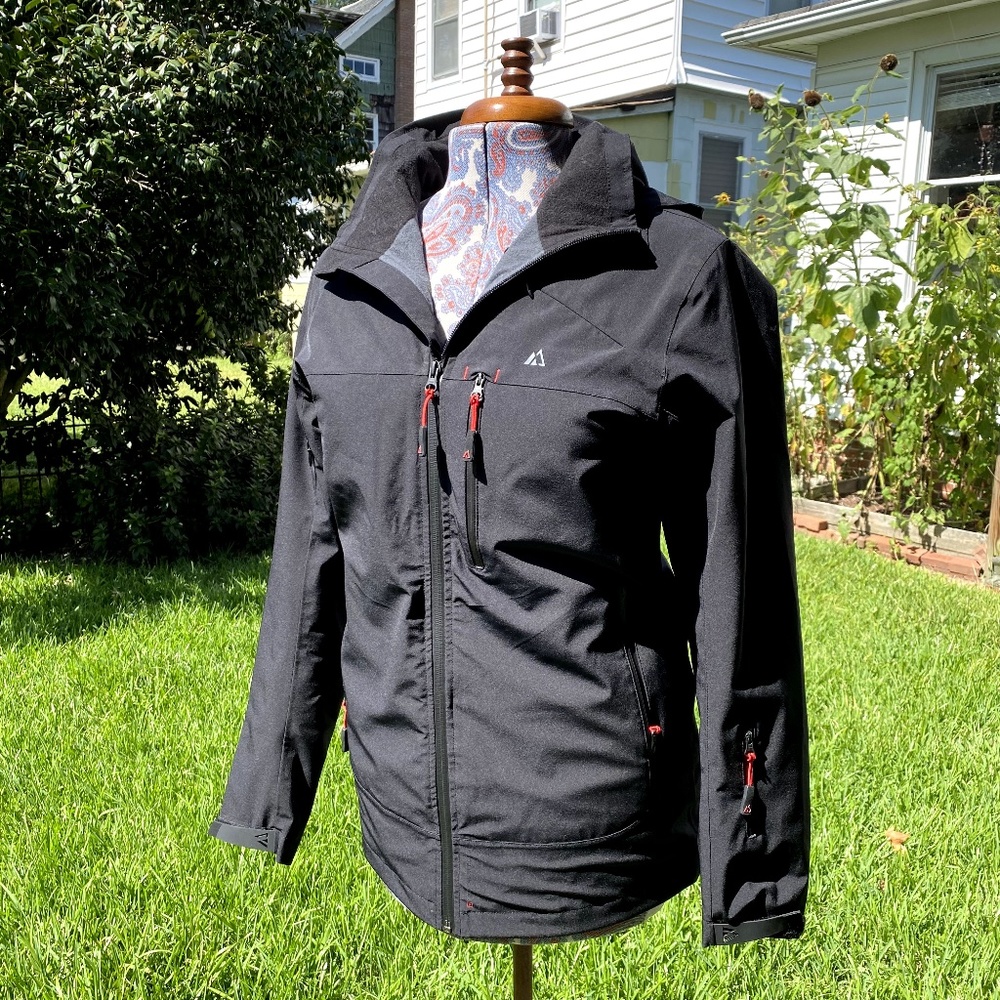 Tons of Pocket Back Rain Jacket Indie